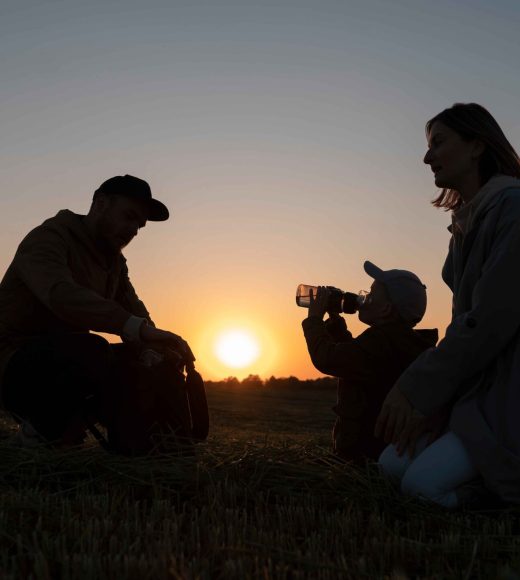 full-shot-family-silhouette-having-fun-sunset_11zon
